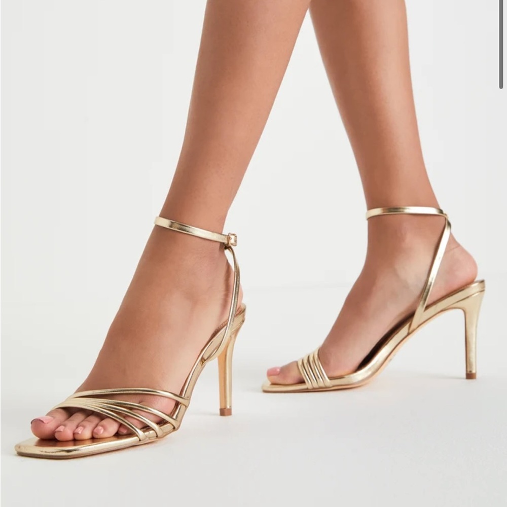 Never worn, gold strappy heels